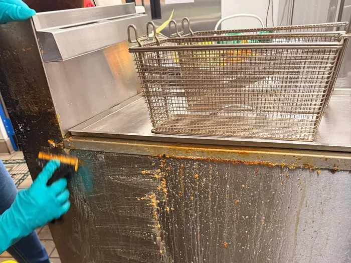 Zeus Cleaning Service crew servicing a commercial kitchen in Buena Park, CA